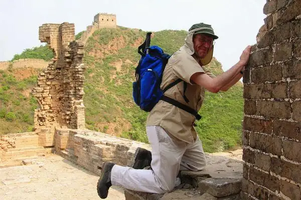 Senior hiking the Great Wall of China