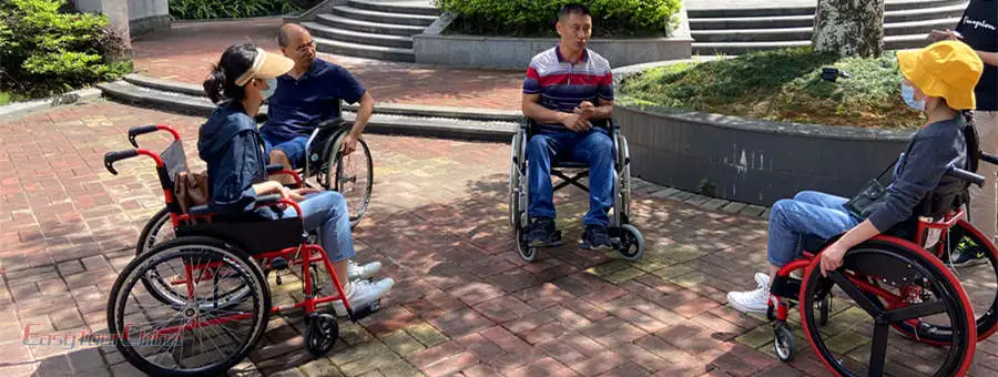 Easy Tour China team learn to use wheelchair
