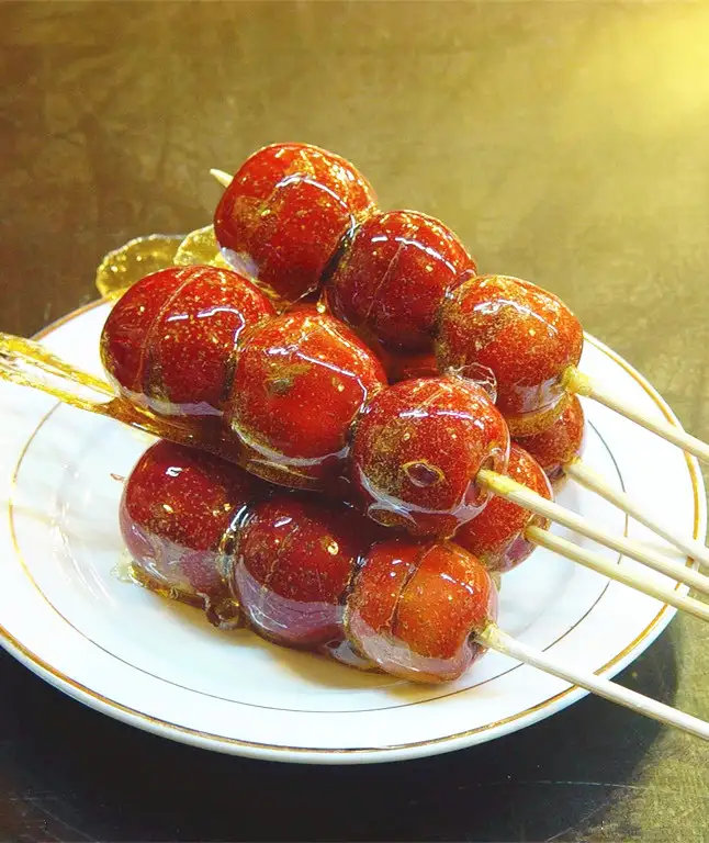 Sugar coated haws on a stick