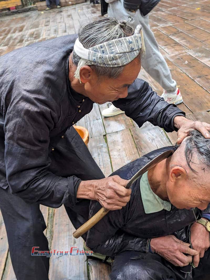 Guizhou haircut with sickle