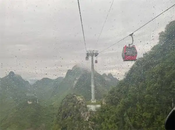 Yangshuo Ruyi Peak Cable Car in Rain