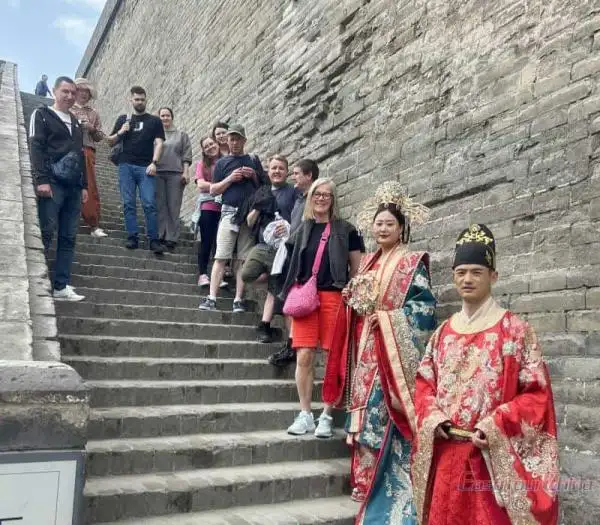 Easytourchina' clients in Xian with locals wearing hanfu wedding clothes
